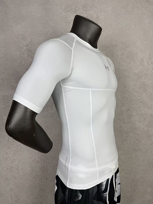 Under Armour T-shirt T · 6
