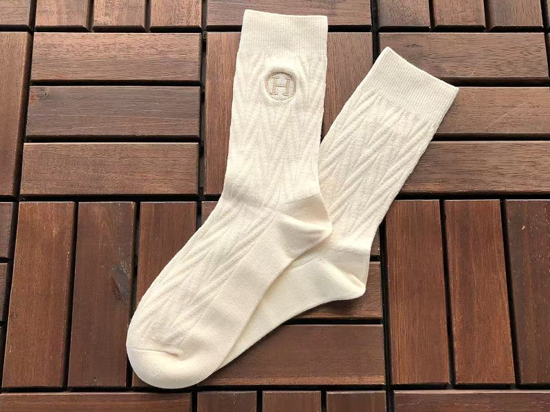 H R E Socks · 4