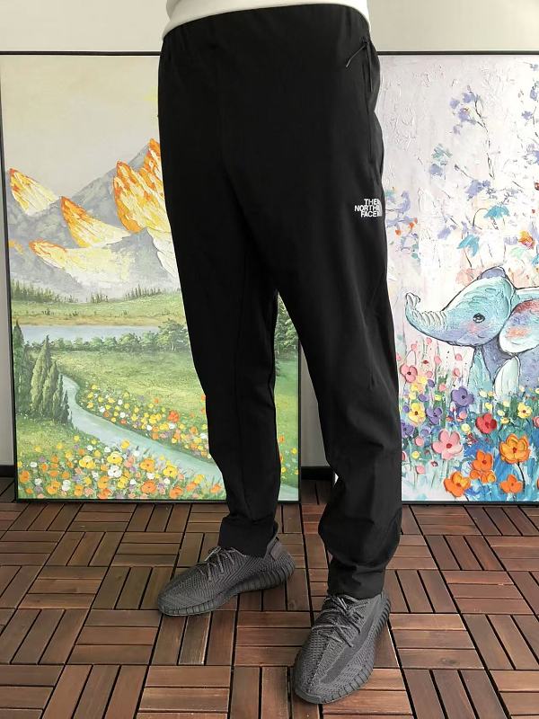 T N F Trousers · 3