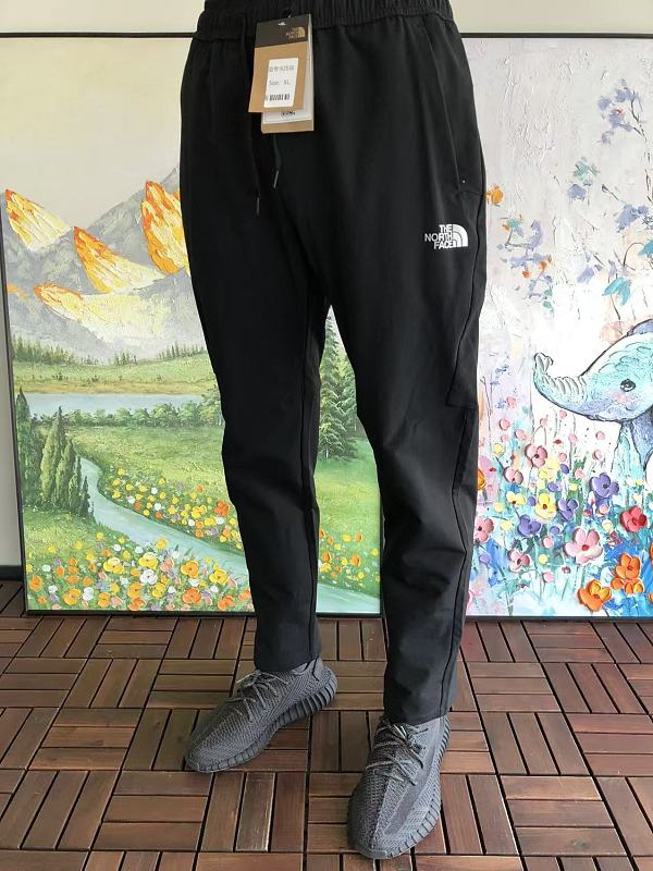 T N F Trousers · 3