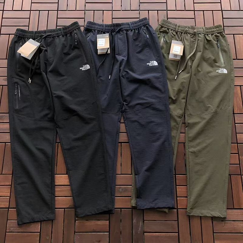 T N F Trousers · 3