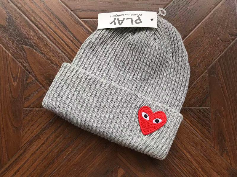 Comme des Garcons Cap 7